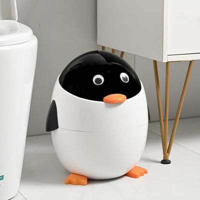Kosh mbeturinash ne forme pinguin